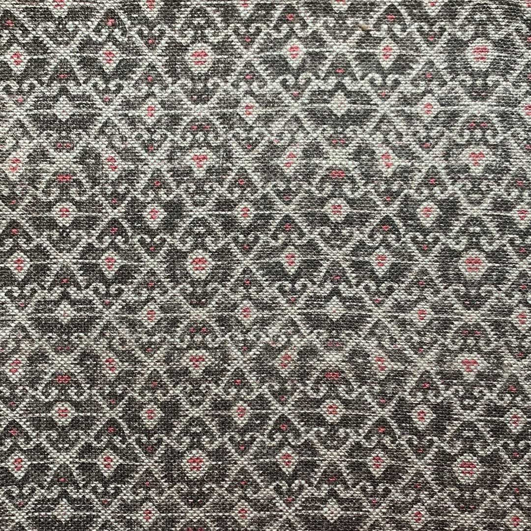 Gordia - Charcoal Red on Pebble Texture
