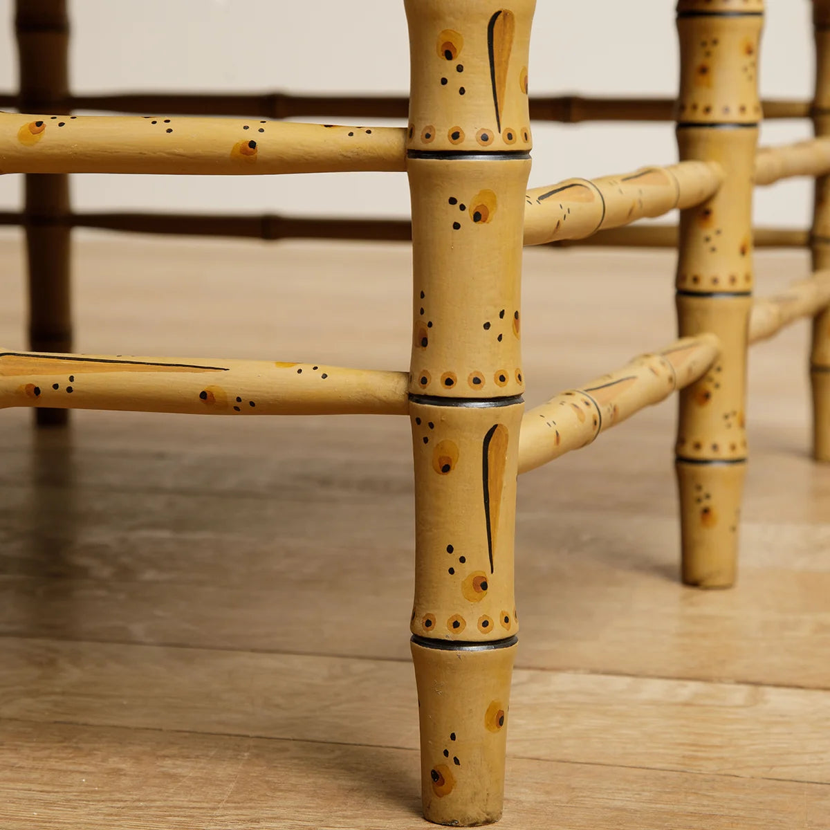 Bamboo Ottoman - hand painted in ochre with traditional paint
